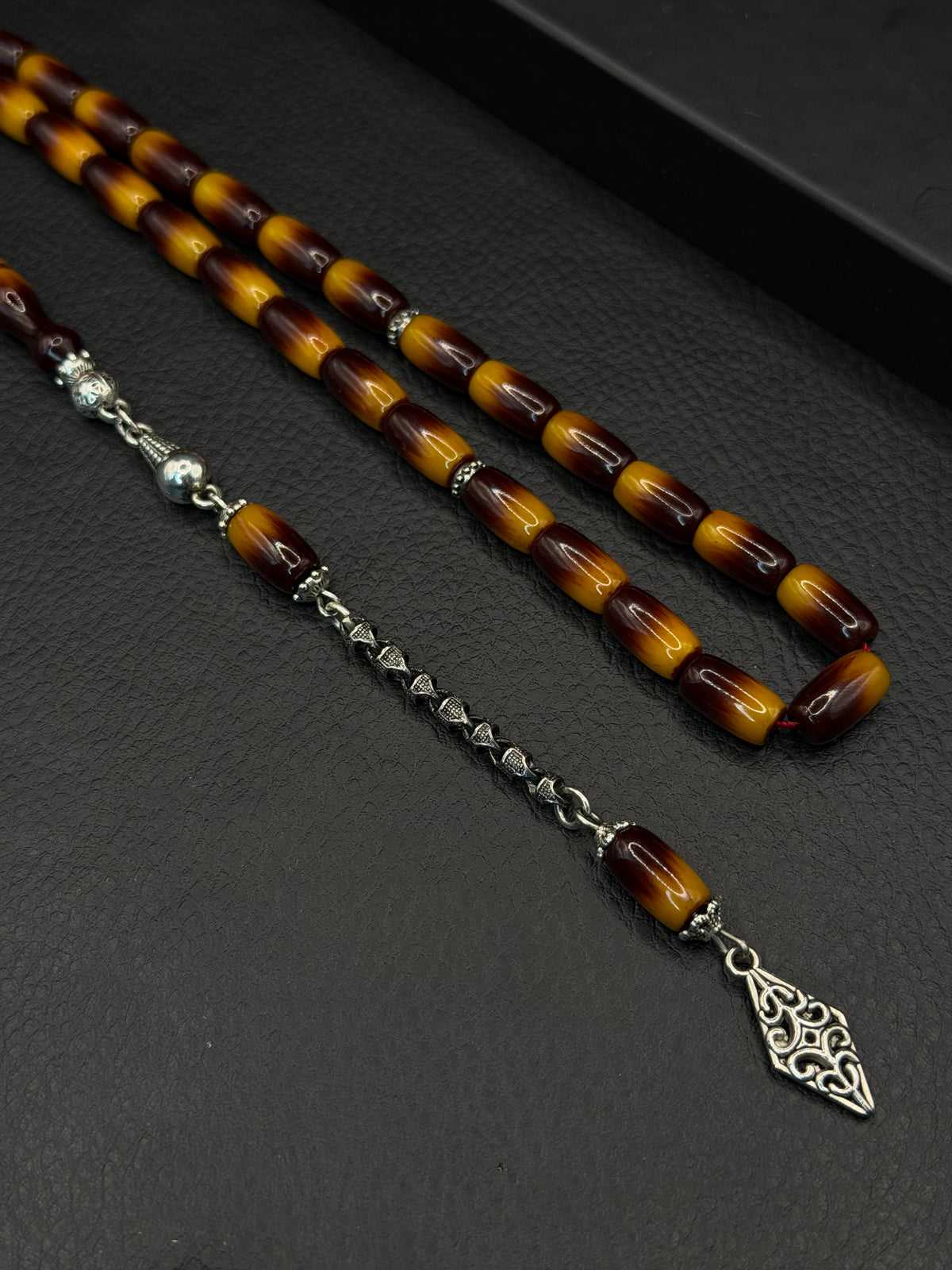 Nael Kaplan Ottoman Style Compressed Amber – Alloy Tassel – Capsule Cut