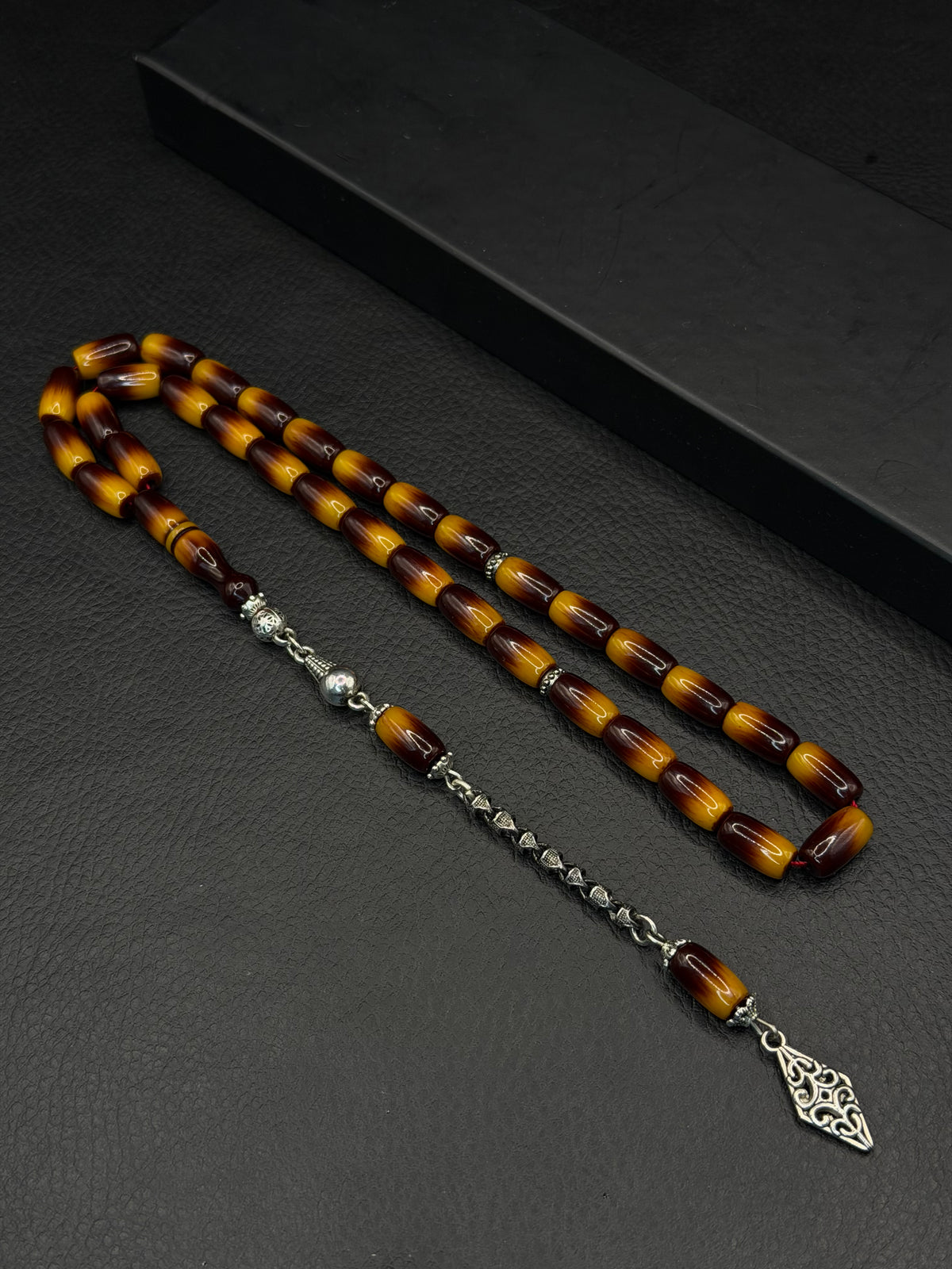 Nael Kaplan Ottoman Style Compressed Amber – Alloy Tassel – Capsule Cut