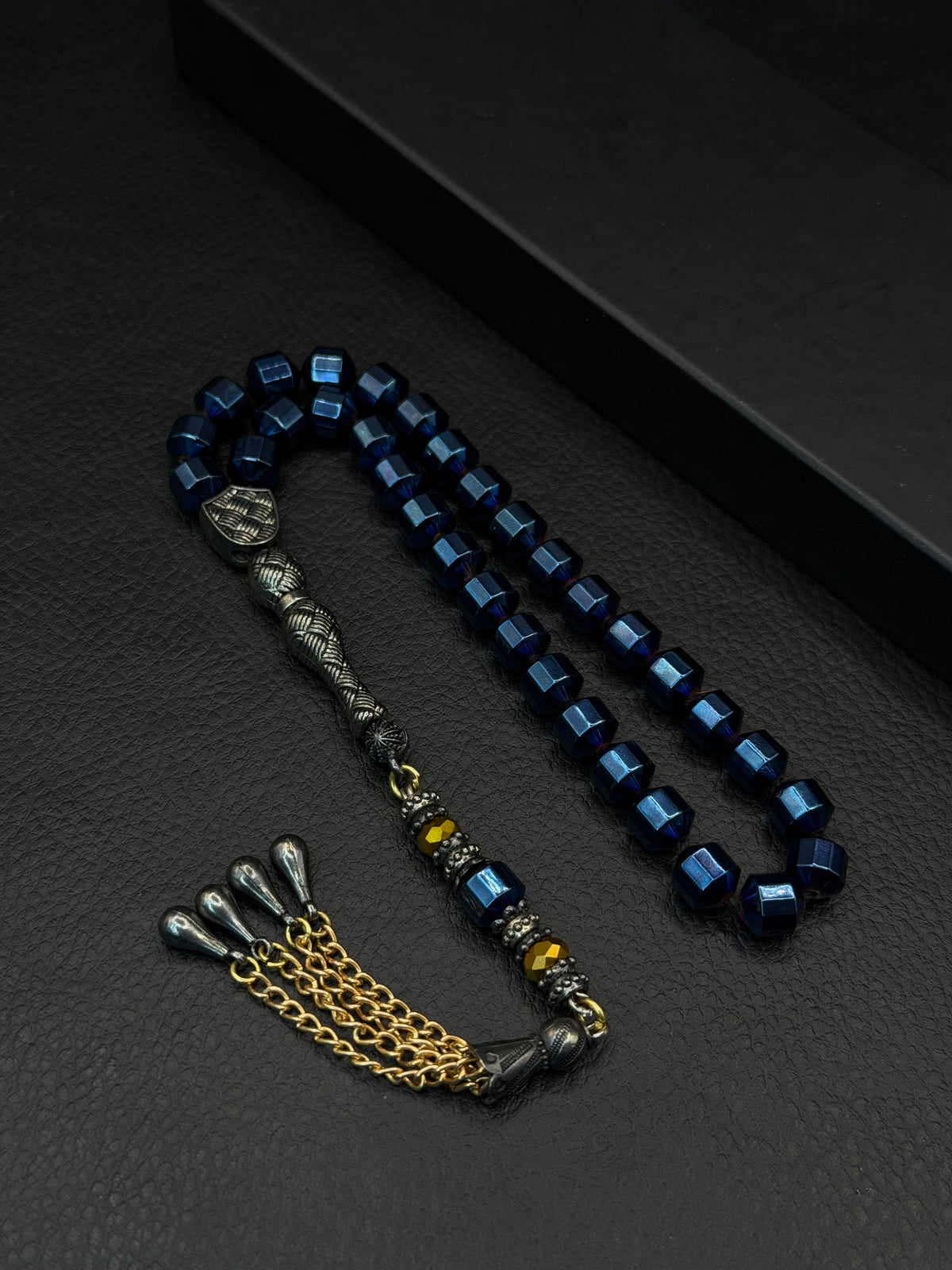 Blue-Coloured Natural Hematite Stone Edged Round Cut Tesbih – Alloy Tassel