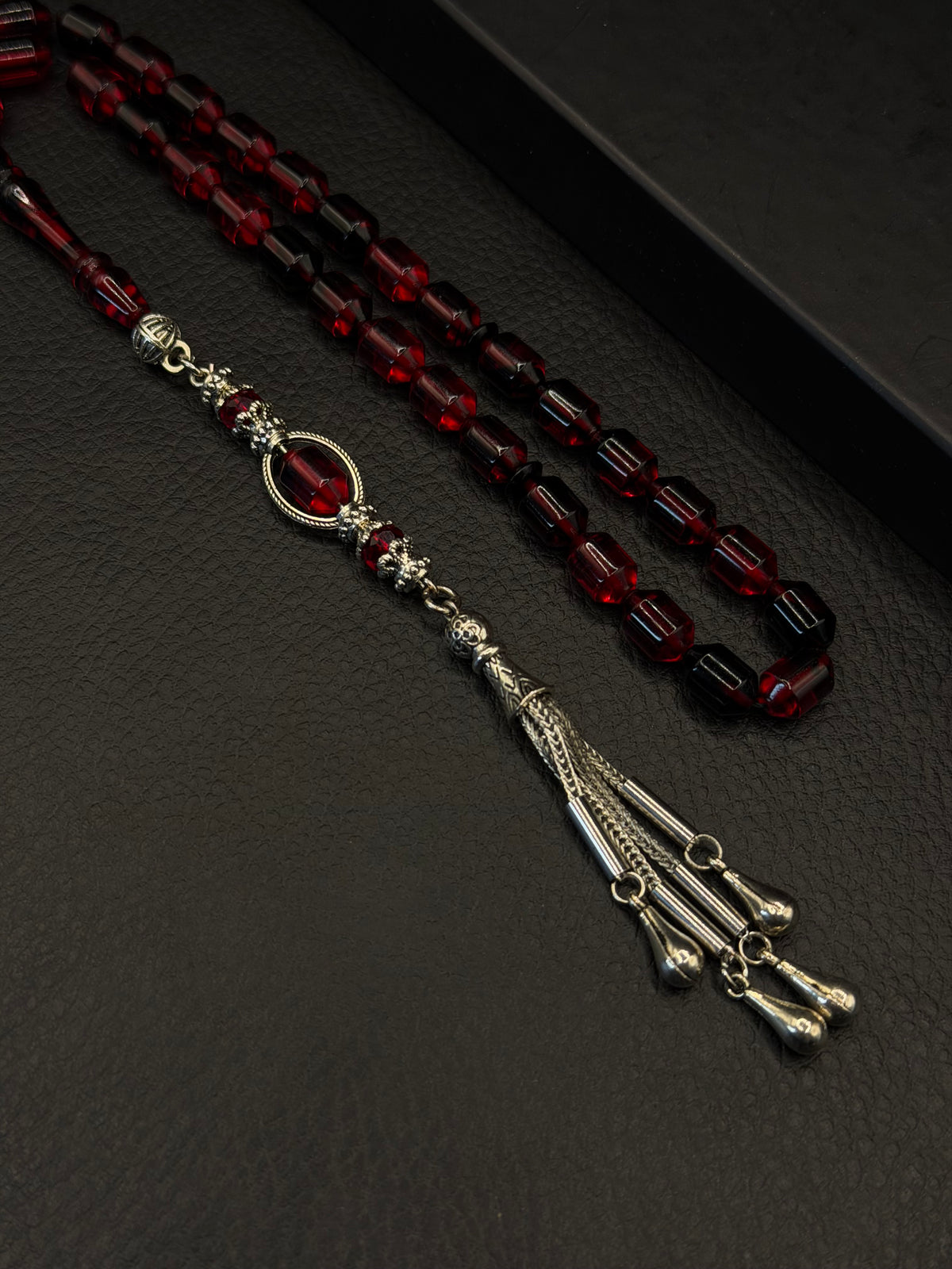 Red & Black Fire Amber Tesbih – Alloy Tassel – Edged Capsule Cut
