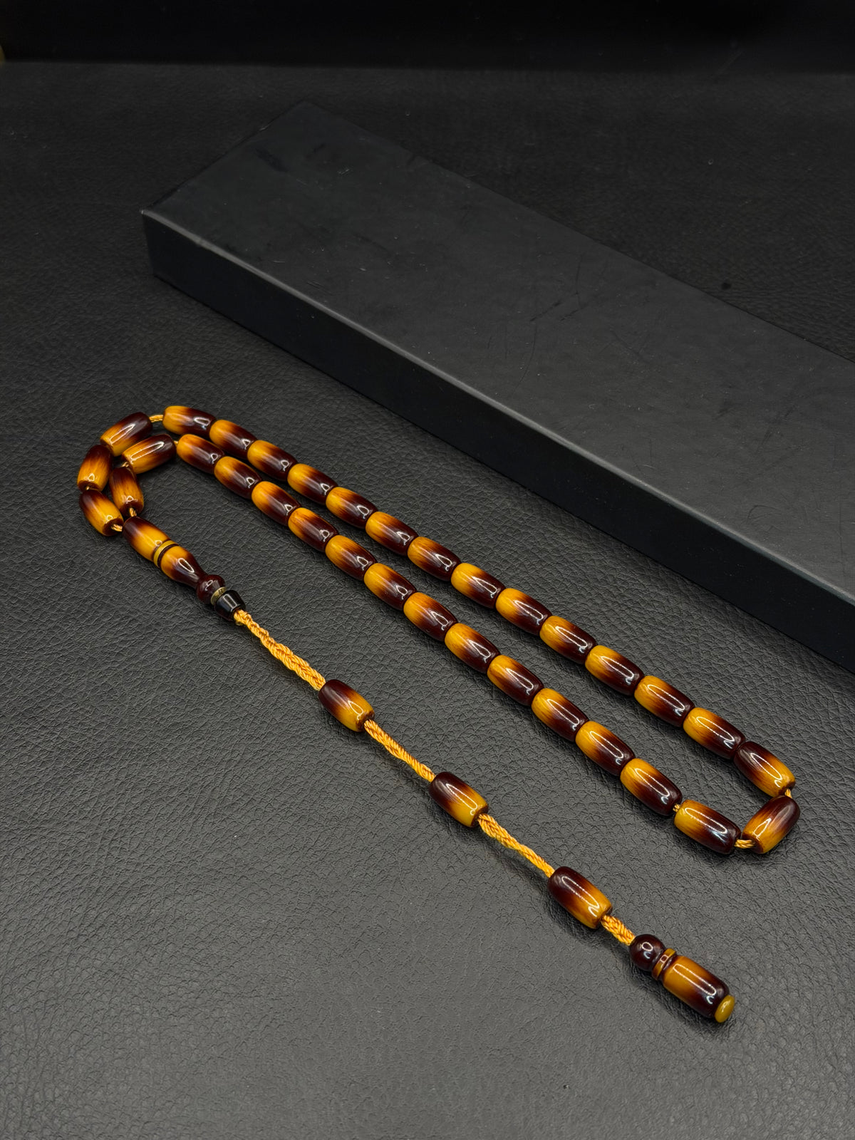 Nael Kaplan Ottoman Style Compressed Amber – System Tassel – Capsule Cut