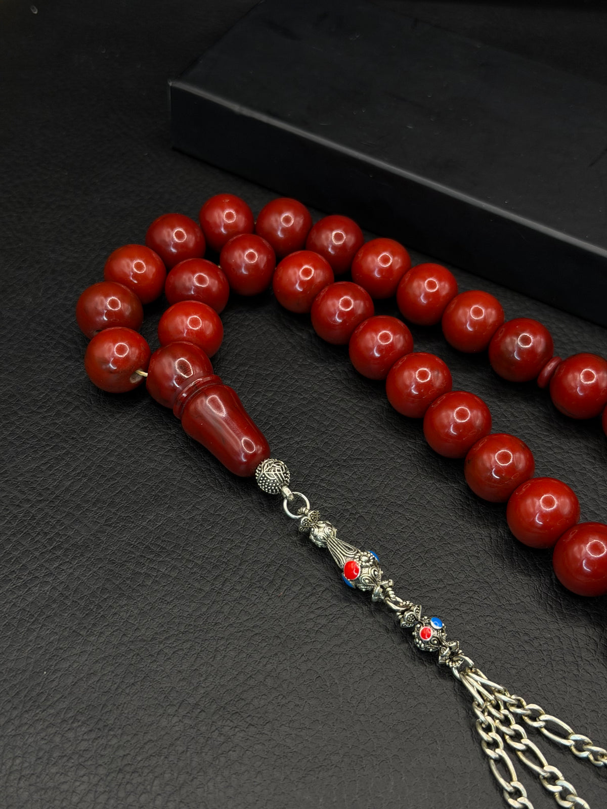 Cherry Compressed Amber – Alloy Tassel – Round Cut
