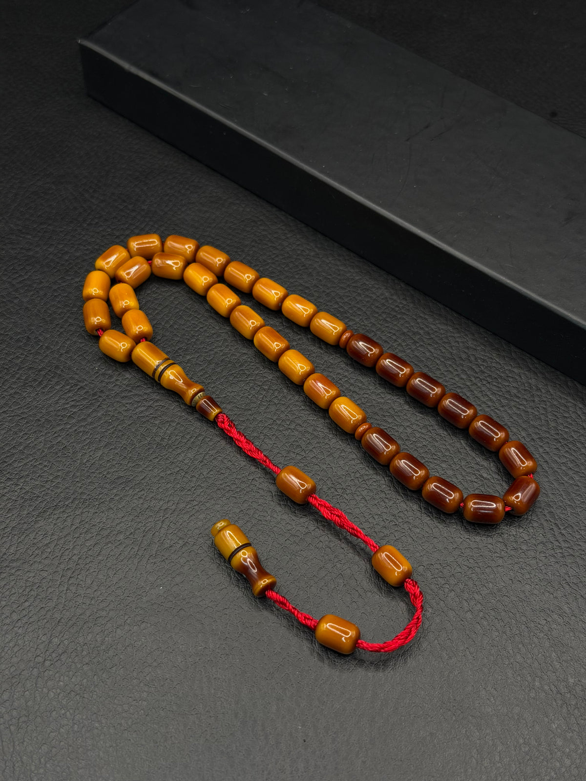 Nael Kaplan Ottoman Style Compressed Amber – System Tassel – Capsule Cut