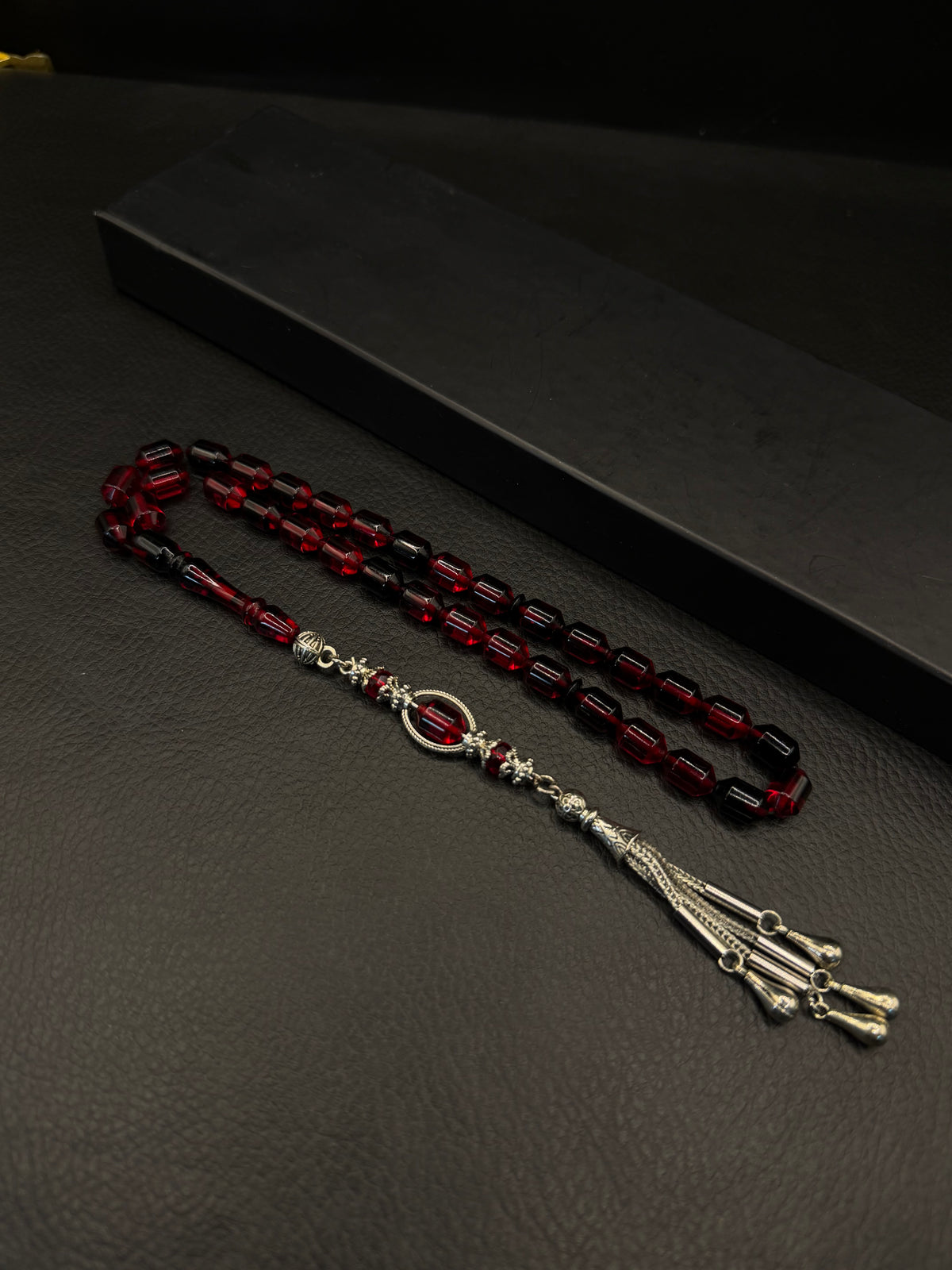 Red & Black Fire Amber Tesbih – Alloy Tassel – Edged Capsule Cut